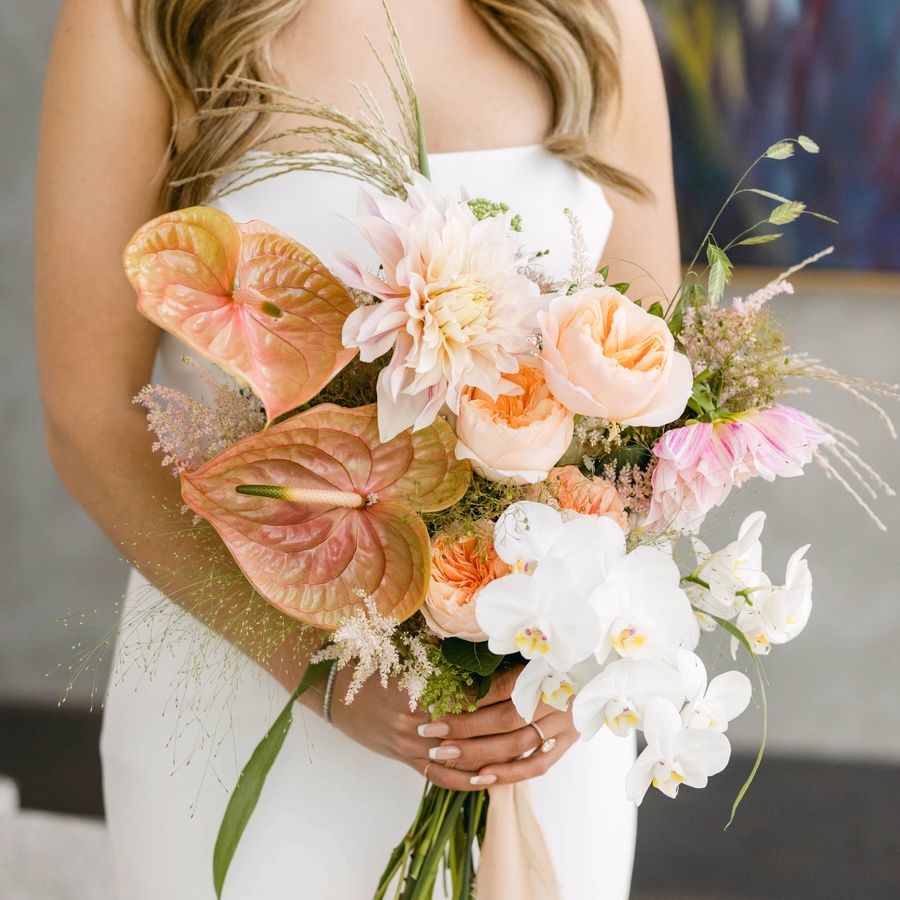 A wedding bouquet of tropical flowers.