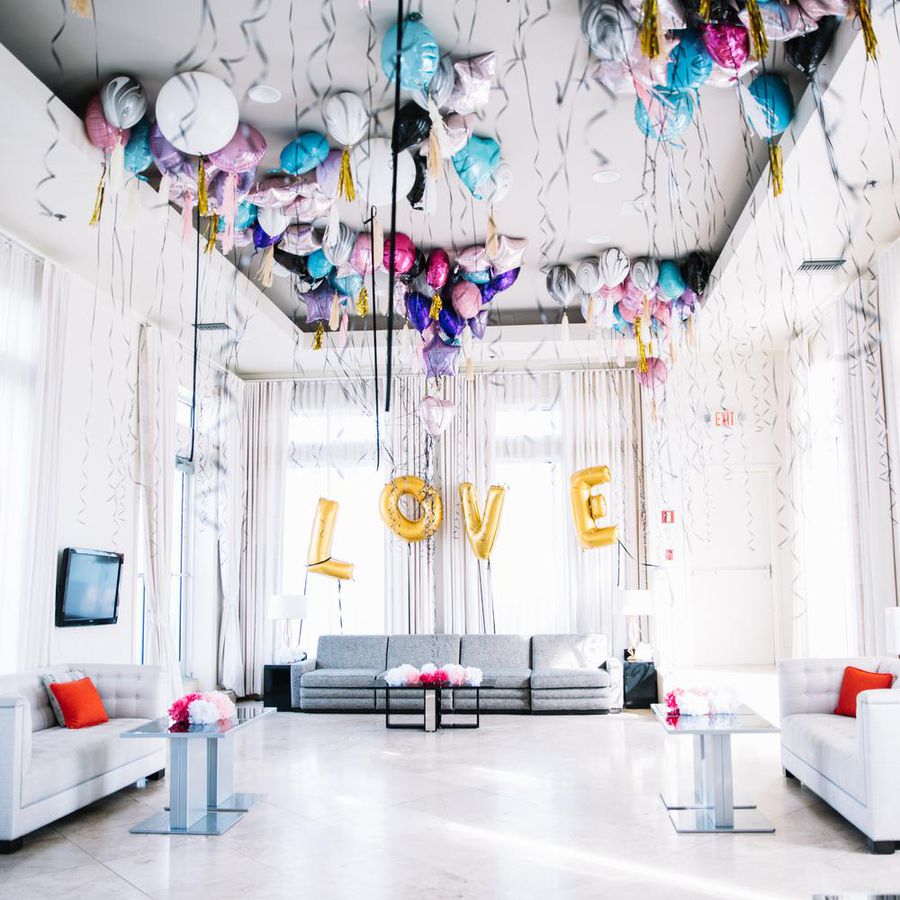 Room filled with multicolored balloons