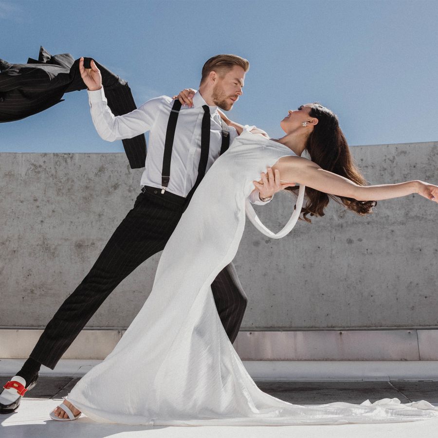 Derek Hough and Hayley Erbert in Formal Attire Dancing on Rooftop