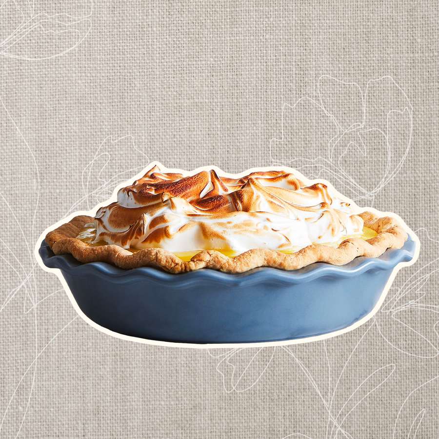 A pie dish on a grey, flowery background