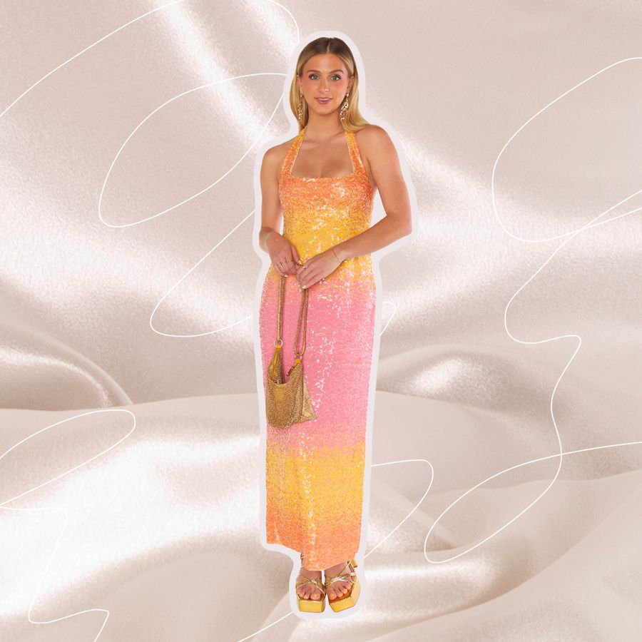 Person wearing a multi-colored dress on a flowy background