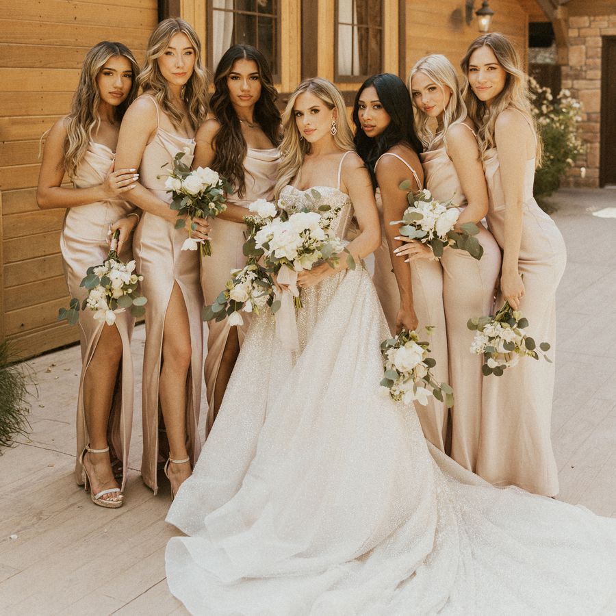 bride and bridal party wearing gold dresses