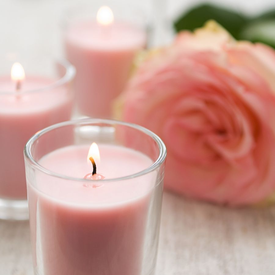 Pink votive candle with pink flower