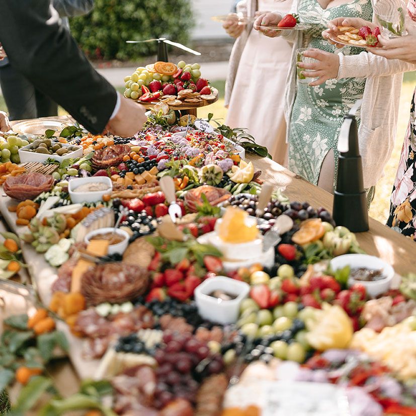 A large grazing table at a wedding reception.