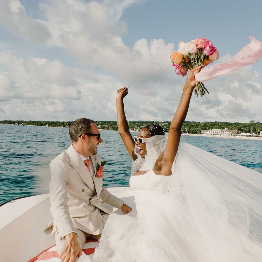 A couple getting married on a boat.