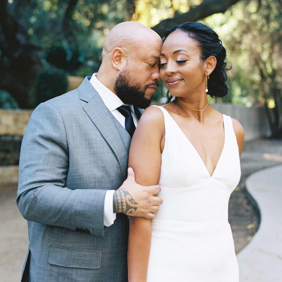 Kahbran White and Niya Mohammed pose for a wedding portrait