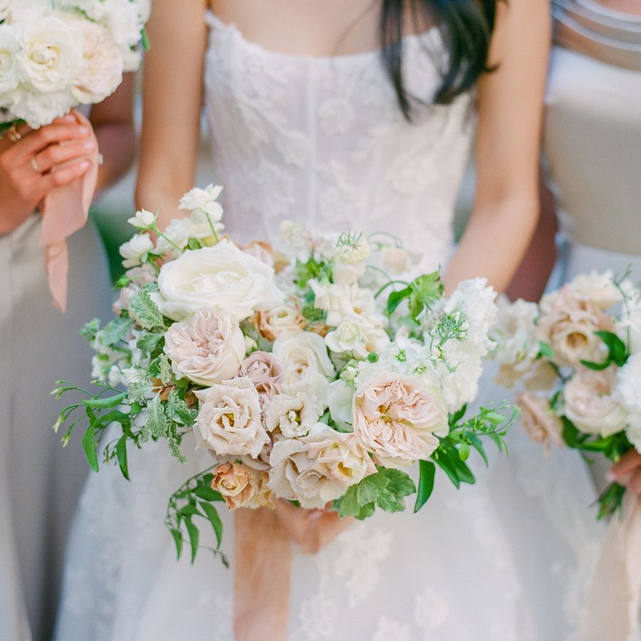 Loose, Romantic Pink and White Wedding Bouquet of Roses, Lisianthus, Sweet Peas, and Greenery