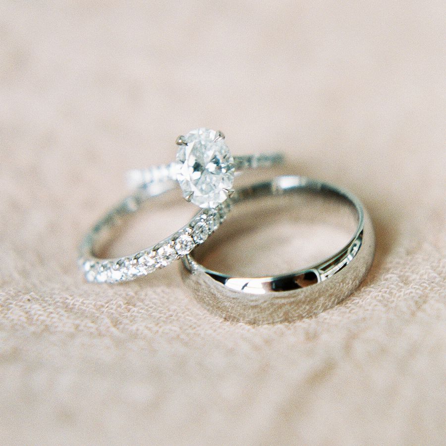 silver wedding rings: a diamond wedding bad, a metal wedding band, a diamond engagement ring