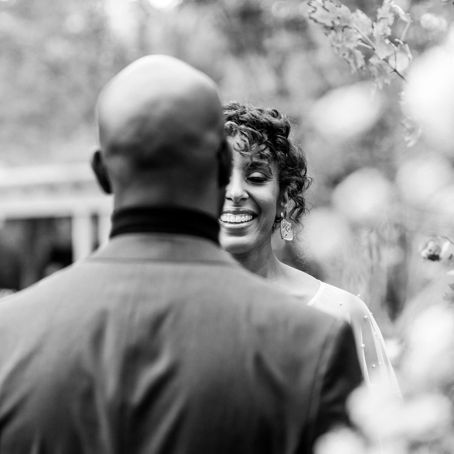 Man looking at smiling woman while proposing
