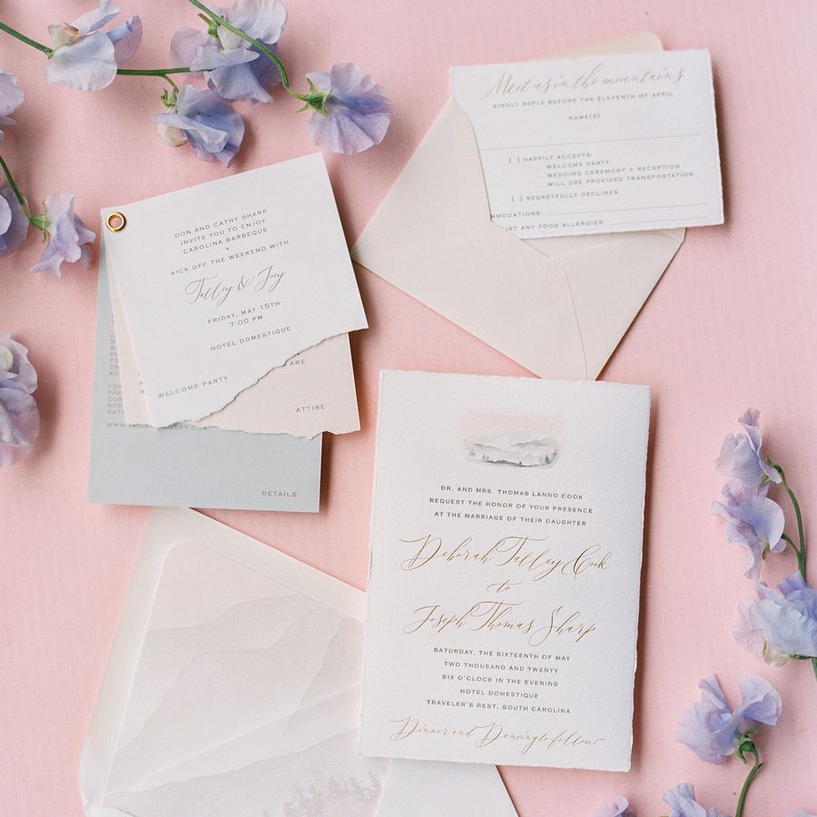 A pastel wedding invitation suite for a spring wedding. 