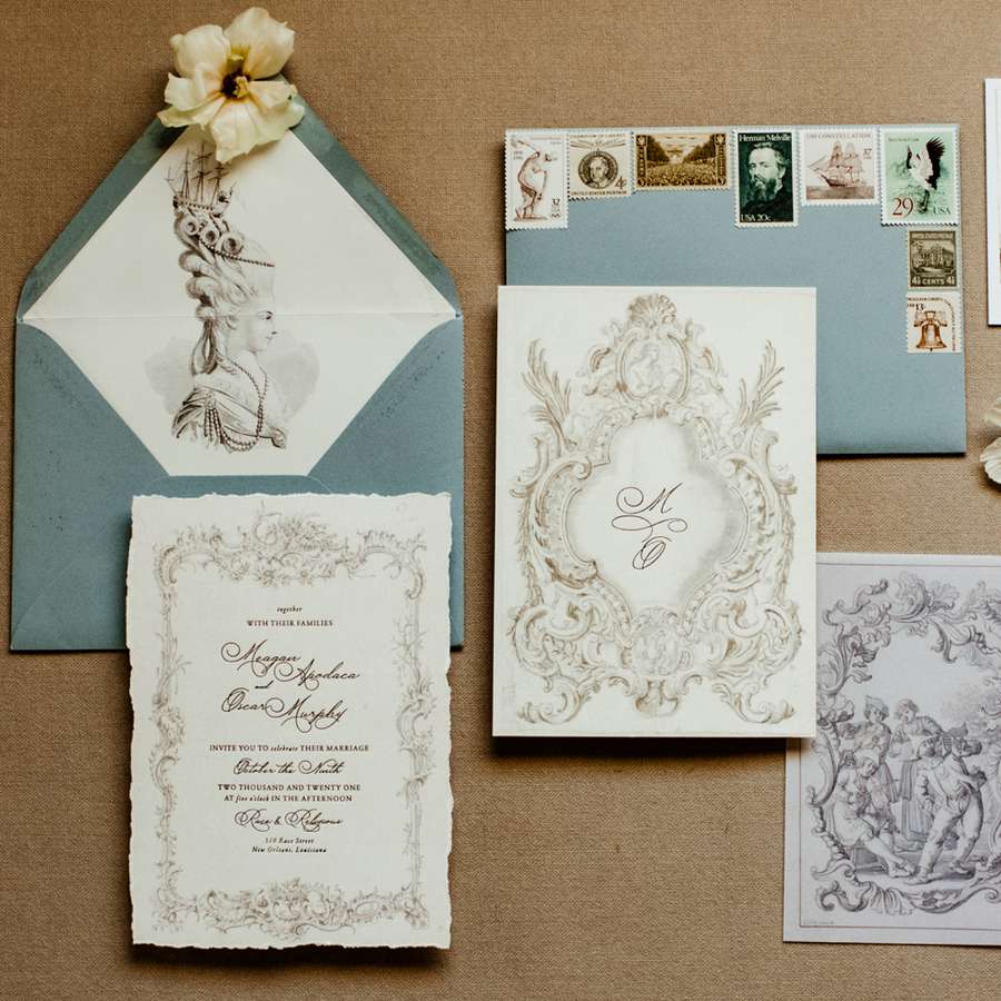victorian wedding-inspired invitation suite with vintage stamps